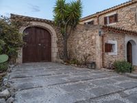 Balearic Islands Farm House under Break of Day Clouds