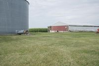 Bancroft, Iowa: Barn and Farm Under a Grey Sky