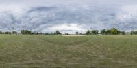 this is an image of a view from a field that looks like baseball field in the grass