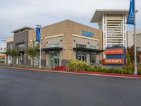 a store front with a large sign for a bank of america on the side of it