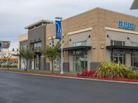 a store front with a large sign for a bank of america on the side of it