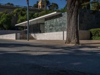 Barcelona's Asphalt Road: Shadows in the Urban Landscape