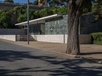 Barcelona's Asphalt Road: Shadows in the Urban Landscape