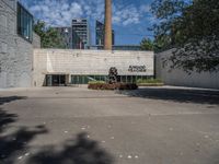 an image of the entrance to a brick building at an industrial complex and factory,