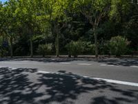 Barcelona City Streets: Asphalt Shadows in Clear Sky