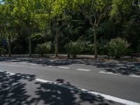 Barcelona City Streets: Asphalt Shadows in Clear Sky