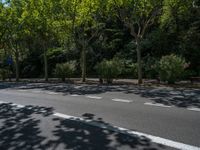 Barcelona City Streets: Asphalt Shadows in Clear Sky