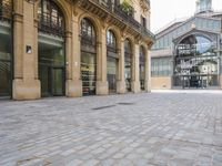 the stone floor is empty and clean with no people or vehicles around it in this building