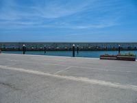 Barcelona's Clear Sky: Ocean Views from the Pier and Jetty