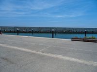 Barcelona's Clear Sky: Ocean Views from the Pier and Jetty