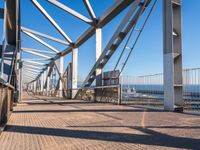 the railing is made of metal and features many different types of angles to it, which makes it a very interesting structure