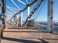 the railing is made of metal and features many different types of angles to it, which makes it a very interesting structure