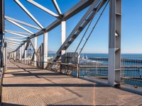 the railing is made of metal and features many different types of angles to it, which makes it a very interesting structure