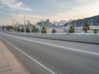 Barcelona's Coastal Dawn: Clouds and Urban Scene