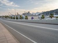 Barcelona's Coastal Dawn: Clouds and Urban Scene