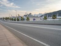 Barcelona's Coastal Dawn: Clouds and Urban Scene