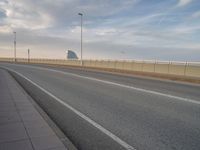 Barcelona's Modern Bridge: A Majestic View of the Coastal Skyline