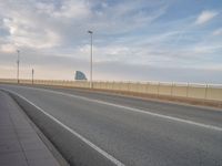 Barcelona's Modern Bridge: A Majestic View of the Coastal Skyline