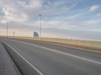 Barcelona's Modern Bridge: A Majestic View of the Coastal Skyline