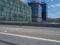 a couple of buildings that are sitting next to each other on the side of a road