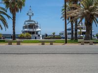 Barcelona's Road: Clear Sky and Palm Trees