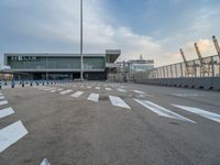 Barcelona Road: Pier by the Coastline at Dawn