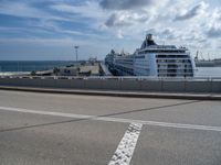 Barcelona, Spain: A Modern Bridge and the Coastal Skyline