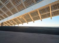 a view of the roof from the ground at the airport and there is no one on it