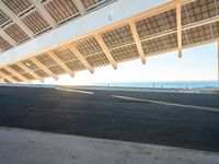 a view of the roof from the ground at the airport and there is no one on it