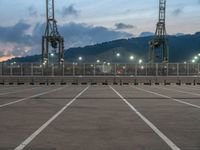 Barcelona: A Straight Road Leading to Coastal Pier