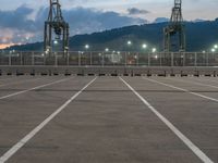 Barcelona: A Straight Road Leading to Coastal Pier