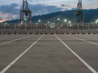 Barcelona: A Straight Road Leading to Coastal Pier