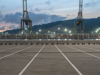 Barcelona: A Straight Road Leading to Coastal Pier