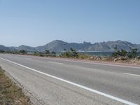 Beach Road in Mallorca: Overlooking the Ocean under a Clear Sky