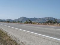 Beach Road in Mallorca: Overlooking the Ocean under a Clear Sky