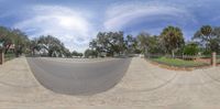 the reflection of people on a skateboard, as they walk in a circle over a paved street