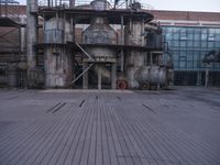 an old factory in an industrial city on a cloudy day by itself with no people