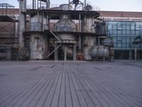 an old factory in an industrial city on a cloudy day by itself with no people
