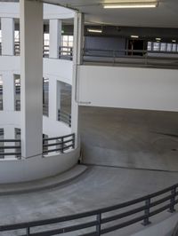 a very big curved concrete ramp with lots of stairs in it's middle levels