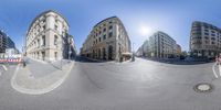 the camera is distorted into three different buildings on a city street in this 360 - shot