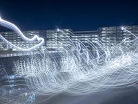 some lights are spinning in a long - exposure photo taken in the daytime hours as the long exposure photograph reflects light