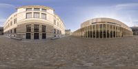 some buildings and bricks with glass windows are shown in three spherical views in this image