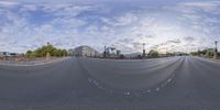 a fish eye view of an empty road through the lens of a fisheye lens