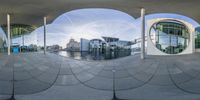 the circular image has been taken from this fish eye view of architecture and water feature