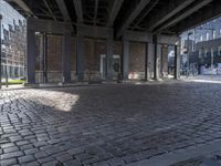 a very old building that has been completely renovated into apartments with brick flooring and floors