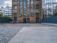 the old brick building is by itself now used as a warehouse and now art gallery