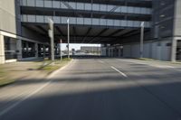 a picture of an underpassed roadway from the side view while driving in a car