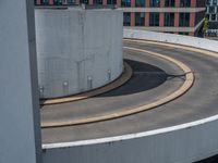 a car is driving on the highway through an underground parking garage area in a city