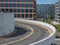 a car is driving on the highway through an underground parking garage area in a city