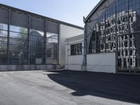 there is a black and white picture with a skateboard in it of a building